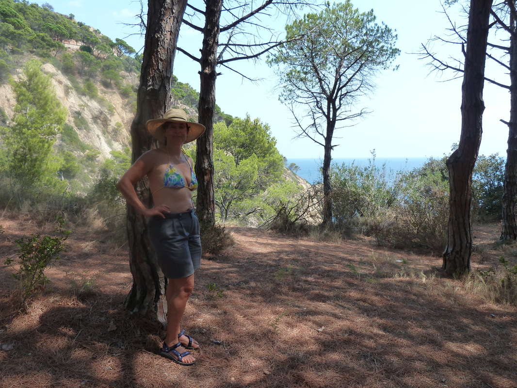 hiking along the Costa Brava near Tossa de Mar, Spain, to find a peaceful cove on the ocean